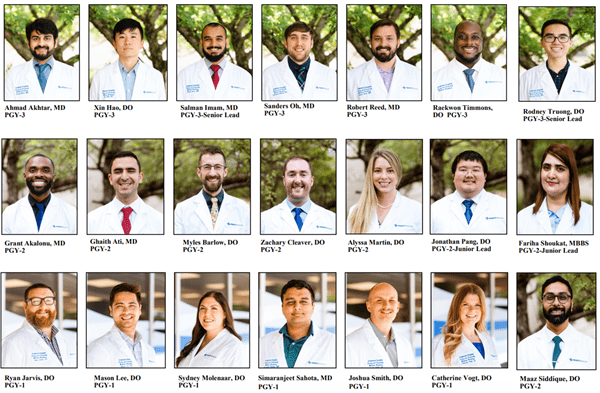 Image of 21 residents wearing lab coats laid out in a grid fashion.